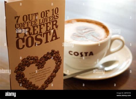 Illustrative Image Of A Costa Coffee Cappuccino And The Three Bean Logo