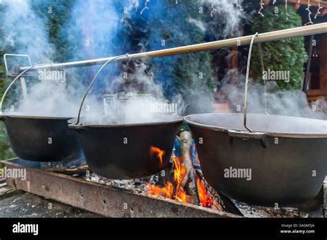 Traditional Cooking In A Pot Over Campfire Stock Photo Alamy