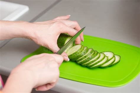 Closeup Female Hands Cutting Cucumber Stock Image Image Of Dinner