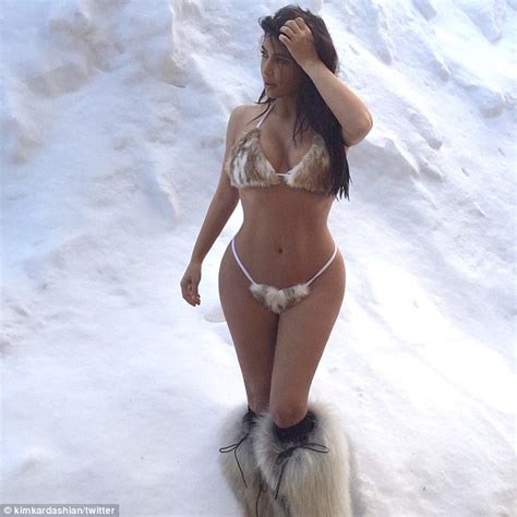 Kim Kardashian Strips Off To Pose In A Fur Bikini As She Plays In The