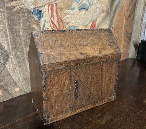 A SMALL RARE 17th CENTURY ENGLISH OAK CHURCH AUMBRY SACREMEMT CUPBOARD