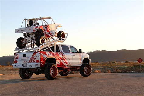 Custom Gmc Sierra With A Roof Top Utv Platform — Gallery