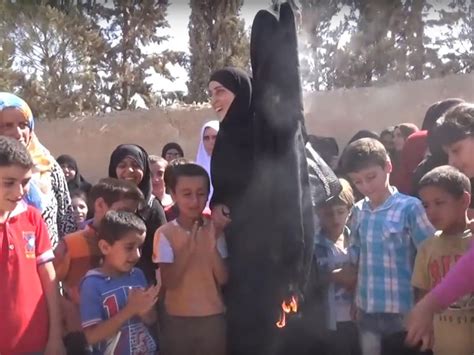 Syrian Women Burn Burqas In Celebration After Being Freed From Isis The Independent The