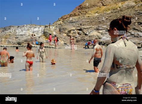 Tourists Visiting The Hot Mud Baths Laghetto Di Fanghi Aeolian