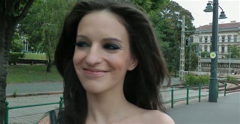 Ugly Brunette Is Walking On A Street