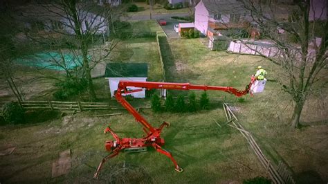 Spider Lift Safety Pruning Trees Around Pool Youtube