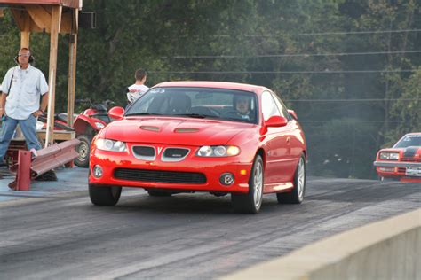 2004 Pontiac GTO 1/4 mile Drag Racing timeslip specs 0-60 - DragTimes.com