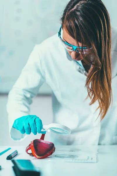 Forensic Science Lab Forensic Scientist Examining Bullet Shell