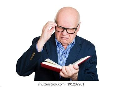 Closeup Elderly Mature Man Holding Book Stock Photo