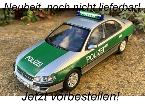 Modelcar Opel Omega B 1996 Polizei Triple 9 1 18 Türen Motorhaube