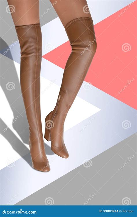 A Girl in Boots with a High Drumstick Caramel Color. Hessian Stock ...