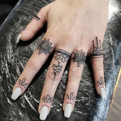 Pin On Tattoo Cover Up Finger Tattoos Hand And Finger Tattoos