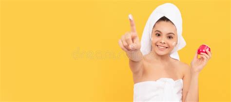 Happy Teen Girl In Shower Towel Apply Facial Cream Selective Focus