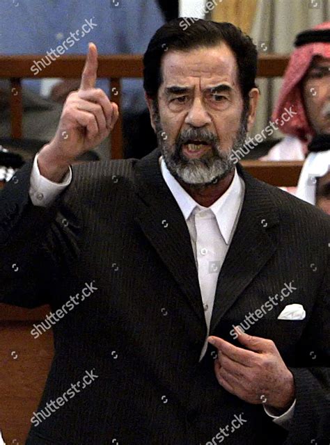 Former Iraqi President Saddam Hussein Gestures Editorial Stock Photo