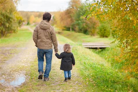 Father And Daughter Walking Together Autumn Day Stock Image Image