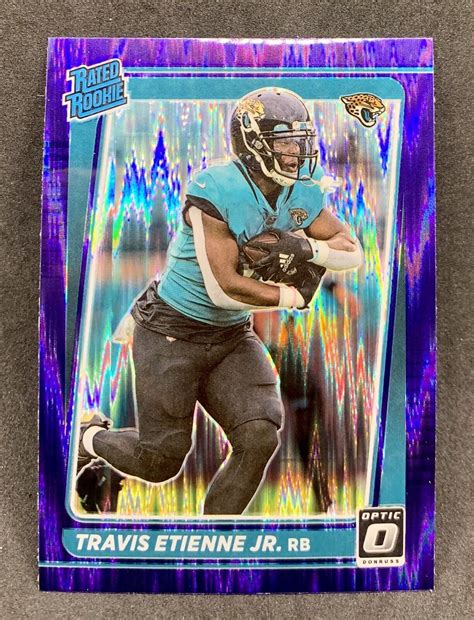 2021 Donruss Optic Travis Etienne Jr Purple Shock Prizm Rated Rookie