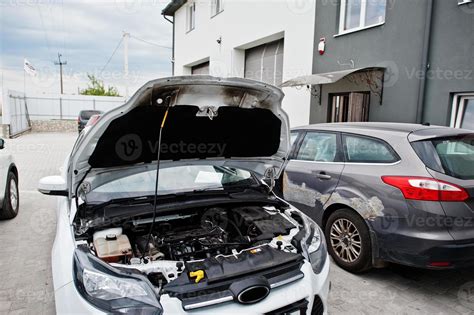 Car repair and maintenance theme. Open hood engine in auto service. 10512239 Stock Photo at Vecteezy