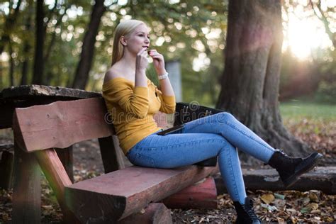 Young Blonde Woman In The Forest Enjoying Nature Stock Image Image Of Sitting Blonde 109741923