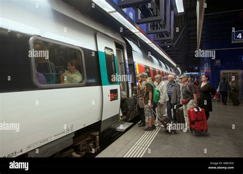 Zurich, Switzerland, passengers at Zurich airport train station get on ...