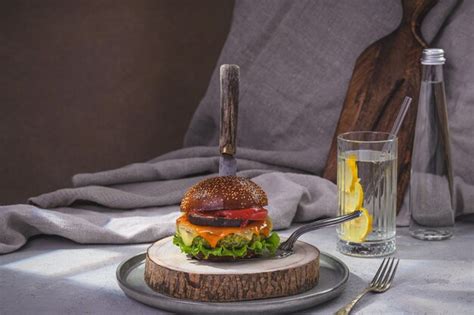 Premium Photo Vegetarian Burger With Spinach And Lemon Drink Rustick