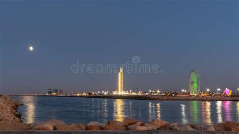 The Great Mosque And Ferris Wheel Under Moonlight Seen From Sablette