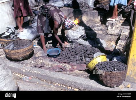 Haiti Charcoal Vendor At The Market Place Port Au Prince Photo