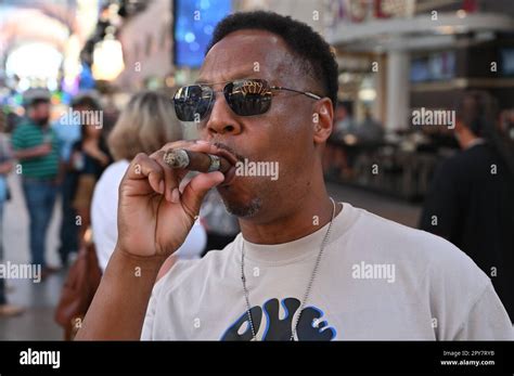 Black Man Smoking A Cigar Stock Photo Alamy