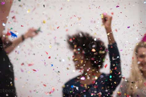 confetti party multiethnic group of people 10660637 Stock Photo at Vecteezy
