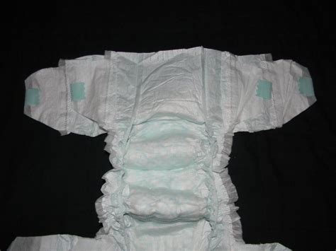 I Have 2 Sample Pampers Size 8 With Double Tabs 0ver 41 Lbs Will Fit 32