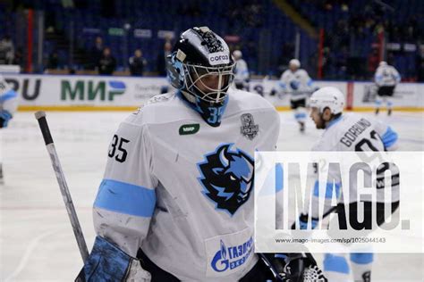 Dinamo Hockey Club Player Alexey Kolosov No 35 Seen In Action During