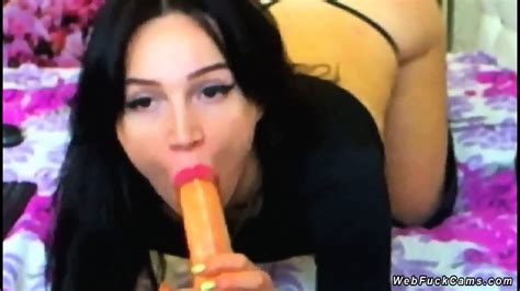 Brunette In Thong Fucks Dildo On Cam
