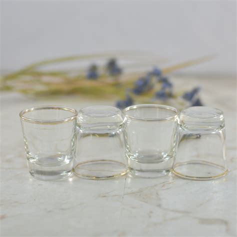 Vintage Set Of Four Gold Rimmed Shot Glasses Clear Shot Etsy Shot Glass Set Gold Rims