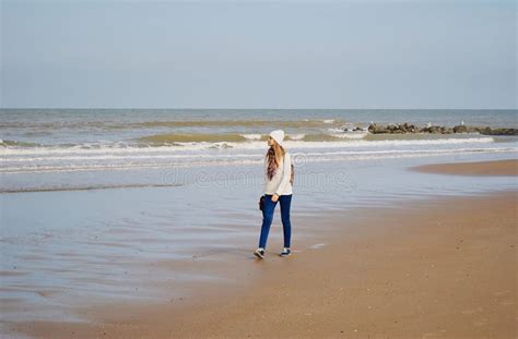 Girl Walking Along The Sea Shore Stock Image Image Of People