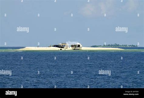 MANILA, Philippines - Photo shows Patag Island (front) and Lawak Island (R back), which are ...