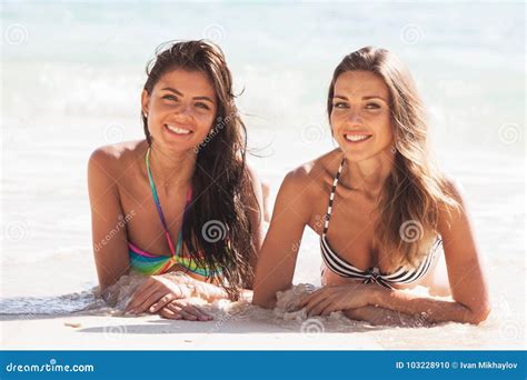 Female friends on vacation stock photo. Image of slim - 103228910 