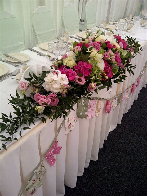 Top table wedding floral arrangement | Wedding table flowers, Wedding ...