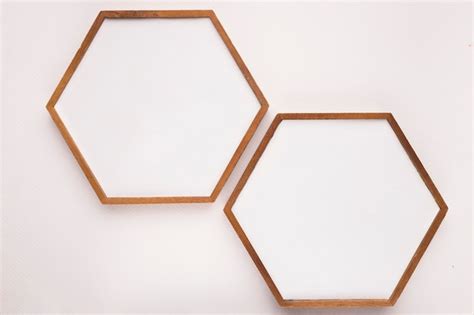 Hexagon Wooden Frame On White Backdrop Free Photo