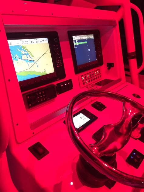 Cool Helm On Yellowfin Center Console Lit By Red Light Center Console