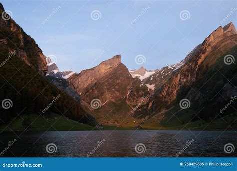 Epic Sunrise by an Alpine Lake in Switzerland Called Seealpsee. the Sun ...