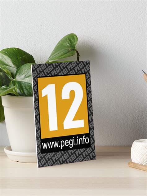 "Videogame Label Pegi 12" Art Board Print for Sale by HuckleberryArts | Redbubble