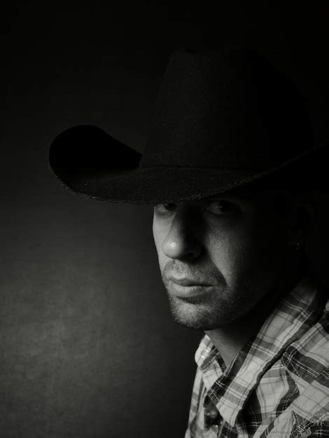 Premium Photo Close Up Portrait Of Man Wearing Hat