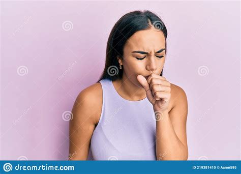 Young Brunette Woman Wearing Casual Clothes Feeling Unwell And Coughing