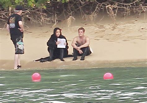 Jennifer Lawrence & Shirtless Josh Hutcherson: 'Catching Fire' Sea ...