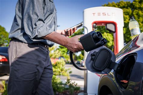 How To Charge A Tesla At A Charging Station Storables