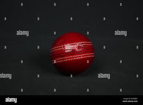 Red cricket ball hi-res stock photography and images - Alamy