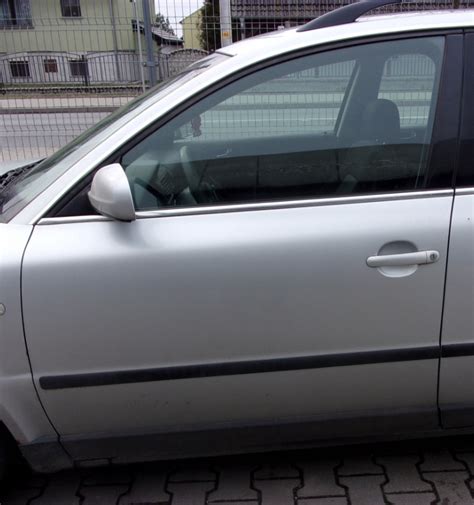 DRZWI PRZÓD LEWE VW PASSAT B5 FL LA7W 13523557315 oficjalne