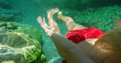 Dive Water And Summer With A Woman In A Bikini Jumping Into A Lake