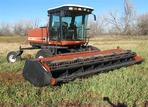 Hesston 8450 Swather In Tampa Ks Item E8173 Sold Purple Wave