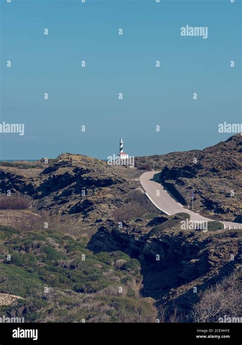 View To Lighthouse Tower And Road In The Mountains In Menorca Stock