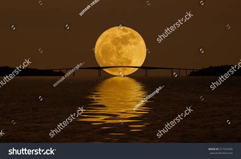 Moon Over The Ocean Over Royalty Free Licensable Stock Photos